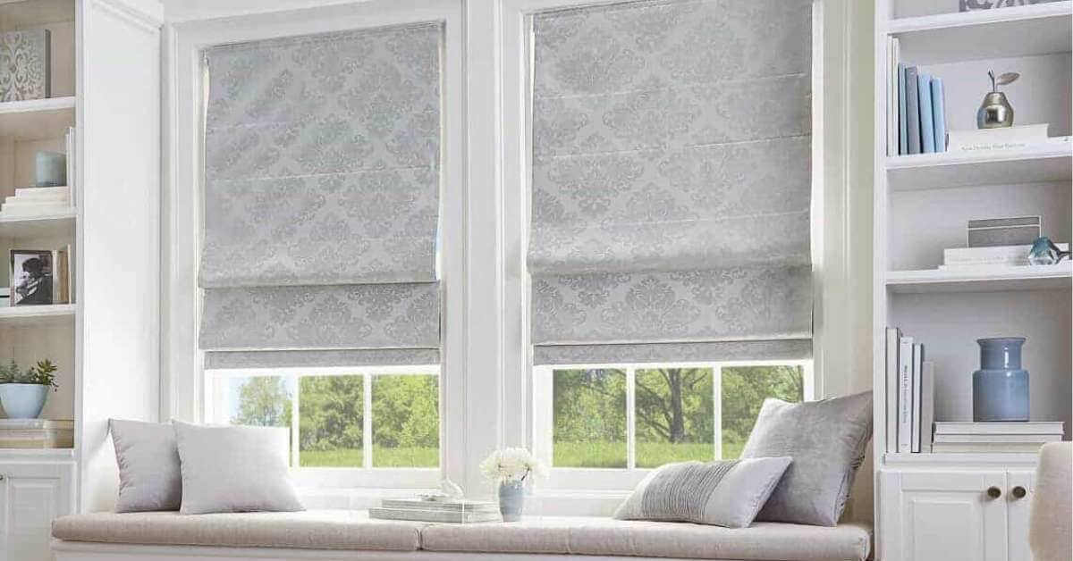 Child-safe Roman shades in the living room, featuring a cordless design for enhanced safety, complementing the cozy and stylish decor.