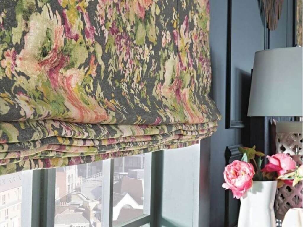 roman shades are good for windows above the bed since it gives soft, elegant look while providing excellent light control and privacy